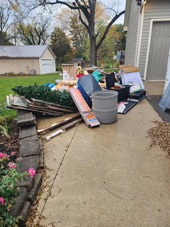 Dumpster being loaded with debris for 3 Yard Dumpster Rental in Santa Rosa
